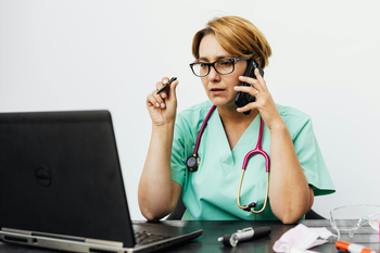 Health provider talking on a phone