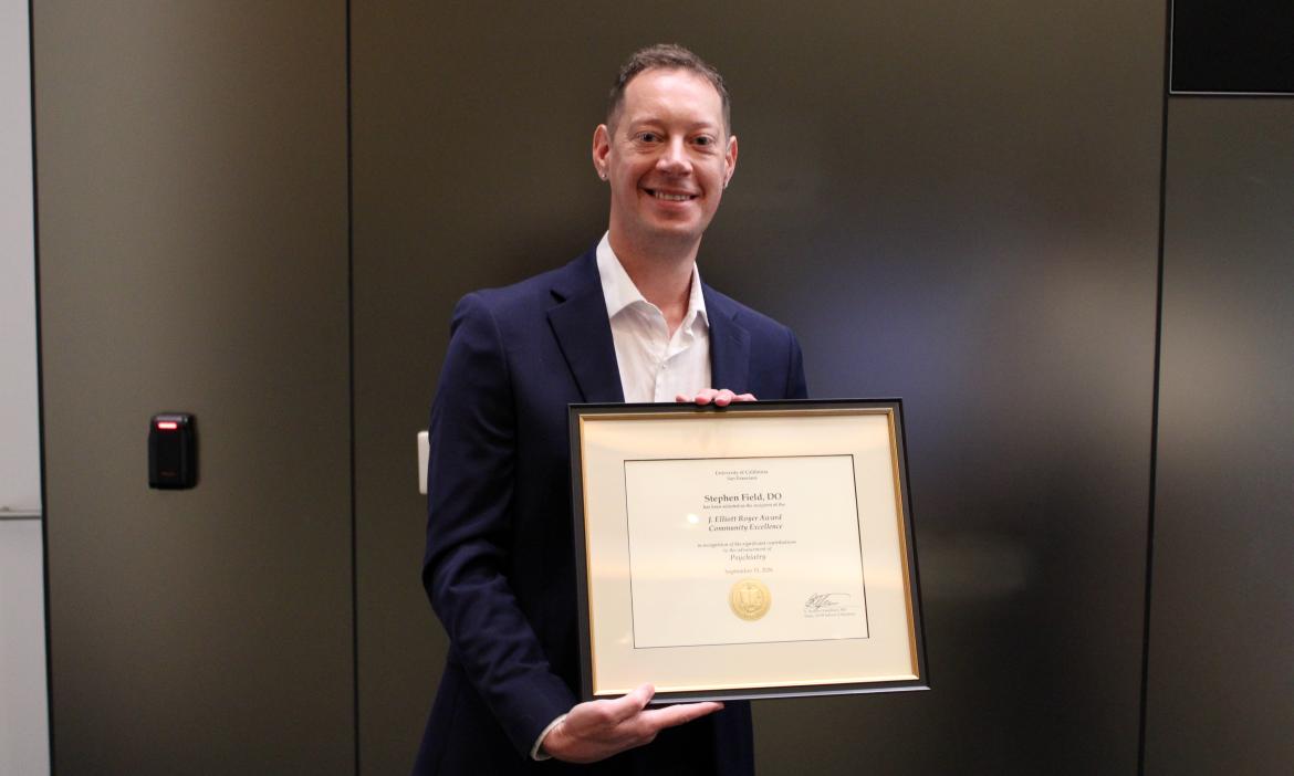 Person holding award