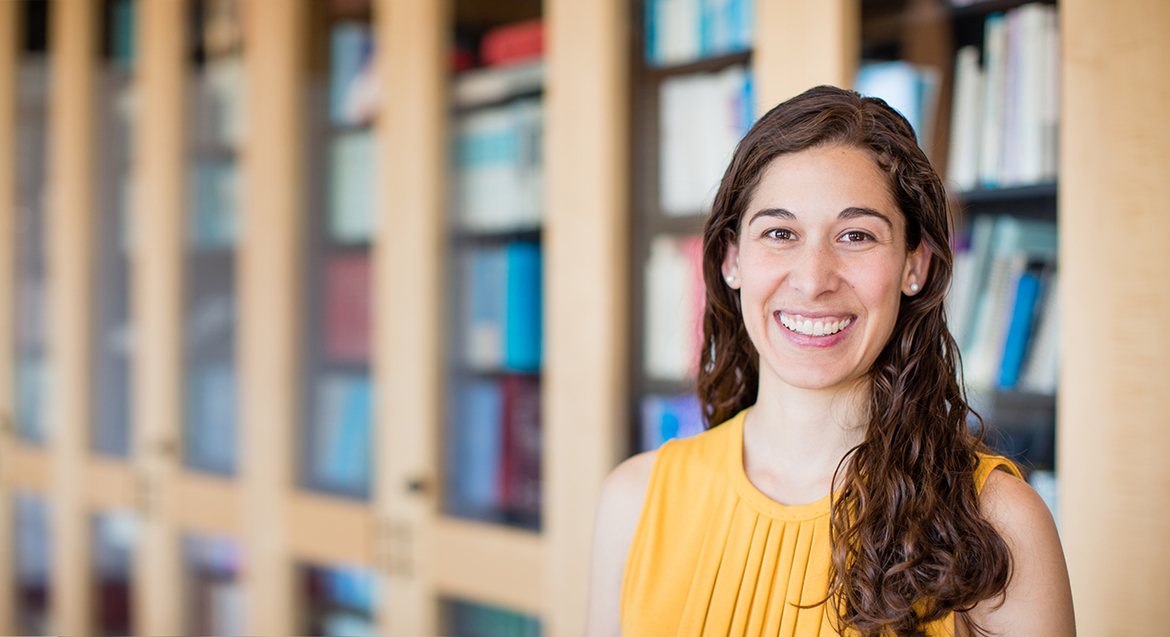 photo of Erin Accurso with bookshelf background