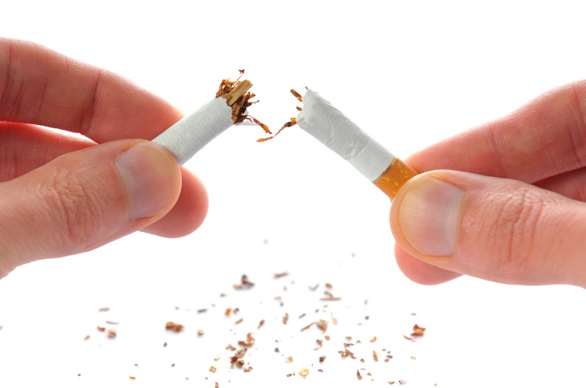Cigarette being snapped in half