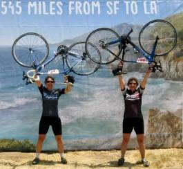 Ellen Haller, MD, left, and her wife Joanne Engel, MD, celebrate the finish of the 2013 AIDS/LifeCycle.