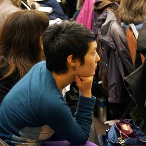 A woman paying attention at a seminar