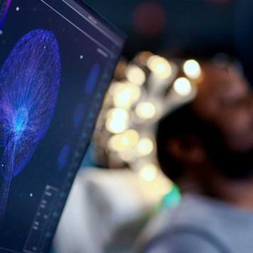 photo of a person receiving an EEG scan